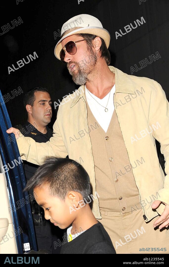 September 25, 2009, New York City Actor Brad Pitt AND Maddox Jolie-Pitt at Dave and Buster's September 25, 2009 in New York City. 25/09/2009