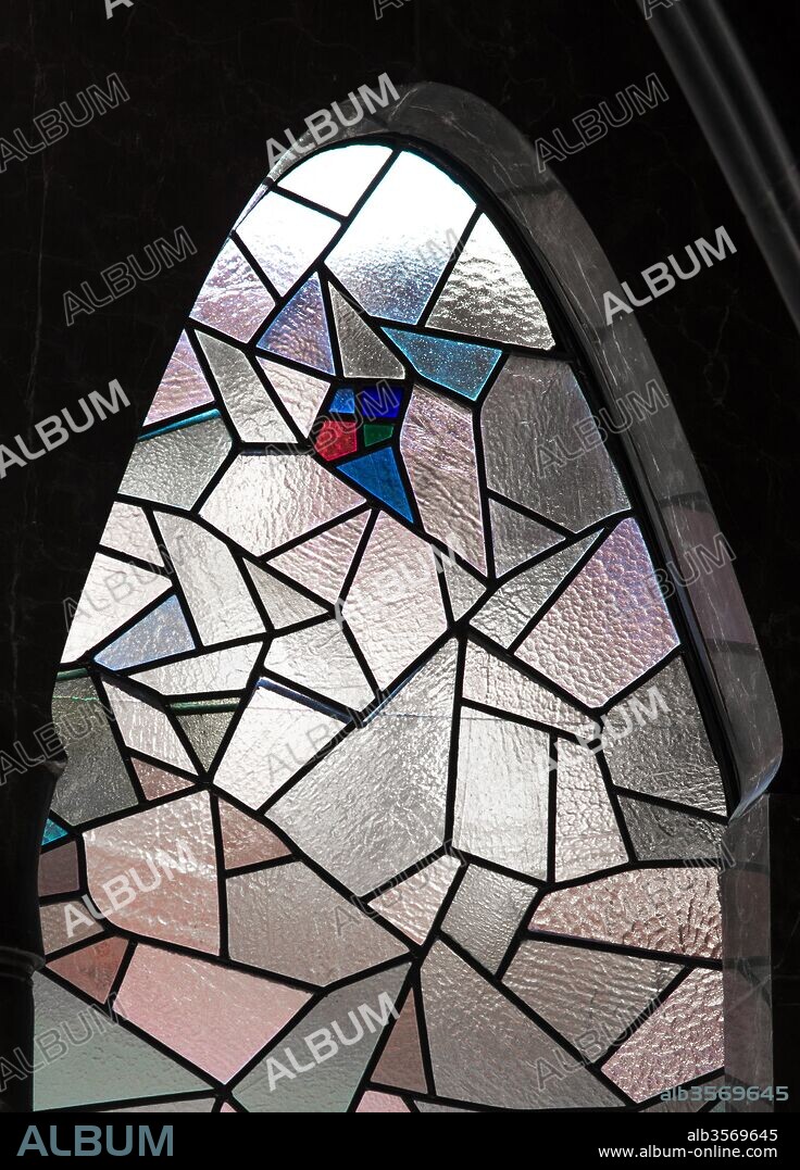 ANTONI GAUDÍ. Antoni Gaudí / Detail of the upper floor glass (attic), made by the Pelegrí workshops, seen from the central room, on the noble floor of the Güell Palace, 1888, Barcelona, Catalonia, Spain.