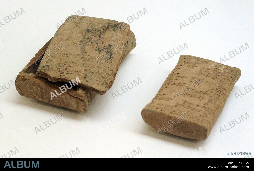 ARTE MESOPOTAMICO. PROXIMO ORIENTE. Tablillas de arcilla. Documentos administrativos y legales escritos en lengua acadia y sumeria. Grafía cuneiforme. Babilonia, Irak. Principios II milenio A. C. Museo del Hermitage (The State Hermitage Museum). San Petersburgo. Rusia.