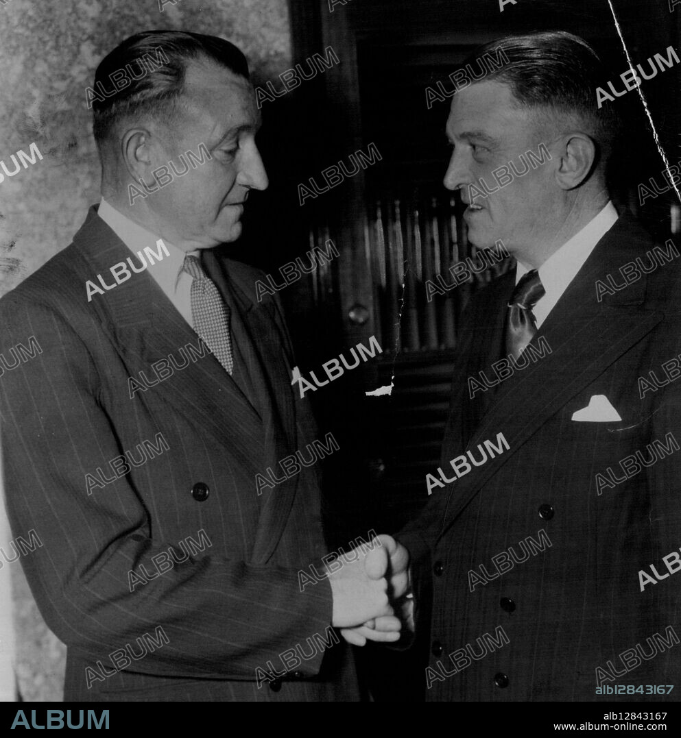 Tom McMahon (left) congratulating George Bishop, who was chosen yesterday to referee the Rugby league Test on Monday. McMahon refereed the Sydney Tests in 1946. July 14, 1950.