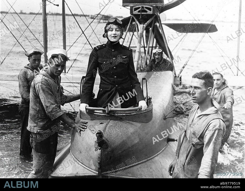 New York, February 1921. Intrepid aeronaut. Mrs. Mildred Harris Chaplin, wife of the famous Charlot, moments before embarking on her fortunate air journey, from Rockraway Naval Air Station to Neuw Rochelle.