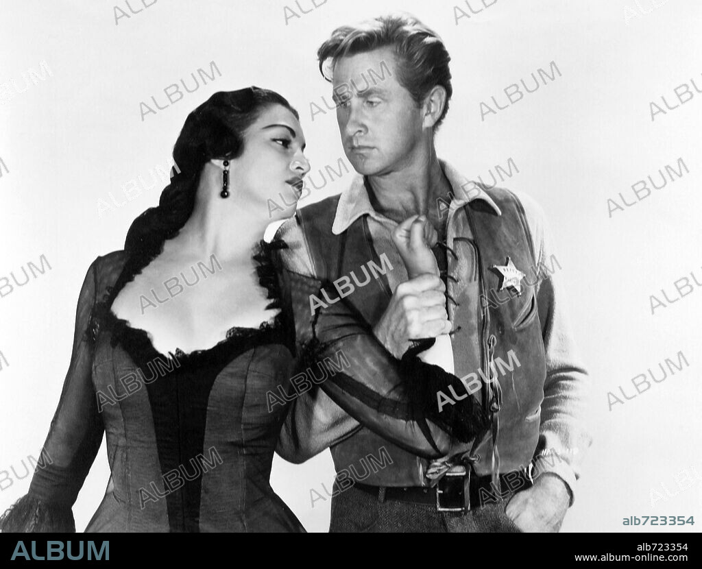 KATY JURADO y LLOYD BRIDGES en SOLO ANTE EL PELIGRO, 1952 (HIGH NOON), dirigida por FRED ZINNEMANN. Copyright STANLEY KRAMER CO./UNITED ARTISTS.