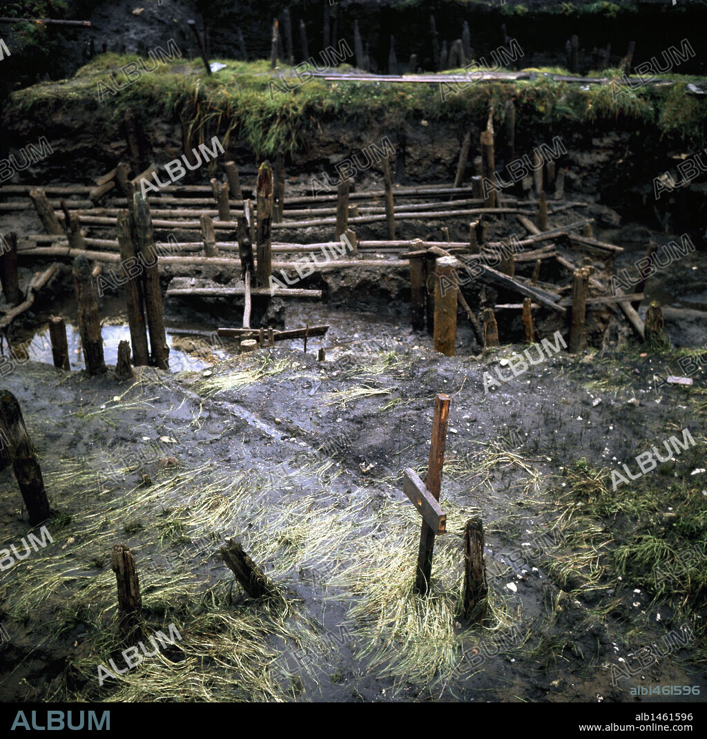 Neolithic Art. Ruins of a prehistoric house built on stilts. Ledro. Lombardy.