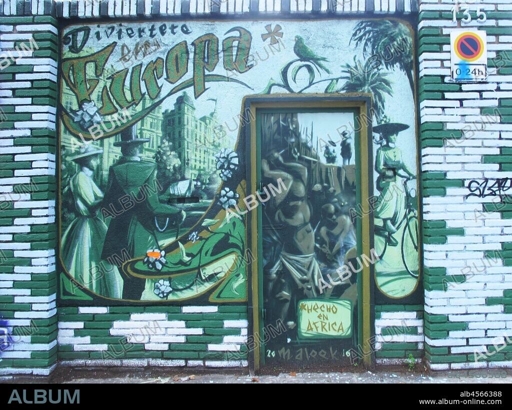 Pintura en aerosol en tonos verdes sobre la Europa señorial y la esclavitud , graffiti mural, calle Venezuela, Poblenou, Distrito San Martin, Barcelona en 2016.