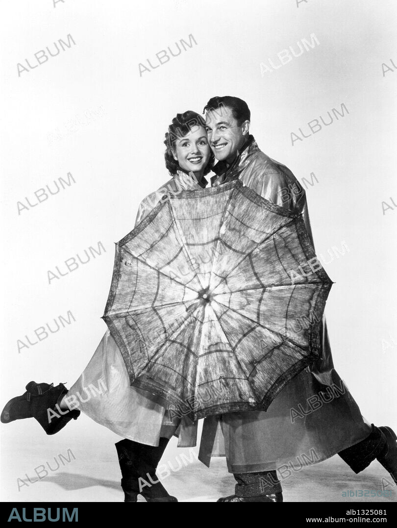 DEBBIE REYNOLDS and GENE KELLY in SINGIN' IN THE RAIN, 1952, directed by GENE KELLY and STANLEY DONEN. Copyright M.G.M.