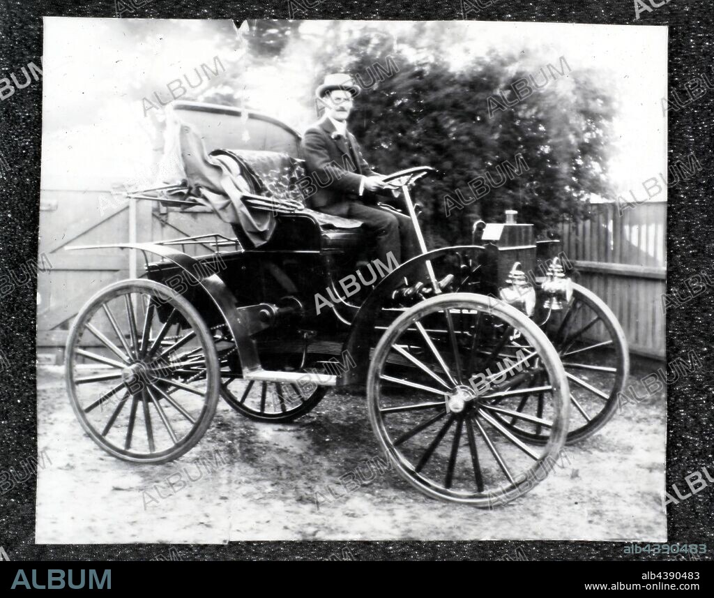 Negative - Thomas M. Arthur & Schacht Motor Buggy, Melbourne, Victoria, circa 1908-1909, Black and white negative of Mr Thomas Montgomery Arthur sitting in a motor buggy, circa 1908-1909. Mr Thomas Montgomery Arthur was a commercial traveler for Henry Berry (Grocers) in Melbourne. The Schacht company produced this type of motor buggy in Cincinnati, Ohio, USA between 1905 and 1909. This image is part of a collection of photographs, negatives and slides used for research by curators at.