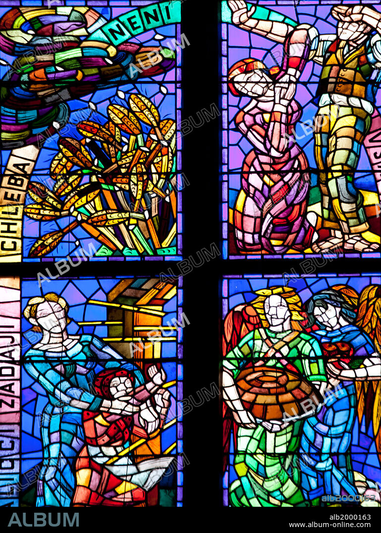 Prague, St. Vitus Cathedral, Thunov Chapel, Stained Glass Window, Psalms, Psalm 126:5. Stained Glass window in the Thunov Chapel, in the St Vitus Cathedral, Prague, Czech Republic. The window was designed by Frantisek Kysela 1929 - 1934, depicting scenes according to Psalms 126:5: "They that sow in tears shall reap in joy". The window portrays natural disasters such as floods, hail storms, fire, death, injury and old age, coupled with biblical quotes. Seen is a close-up of the upper panels of the middle section of the window.