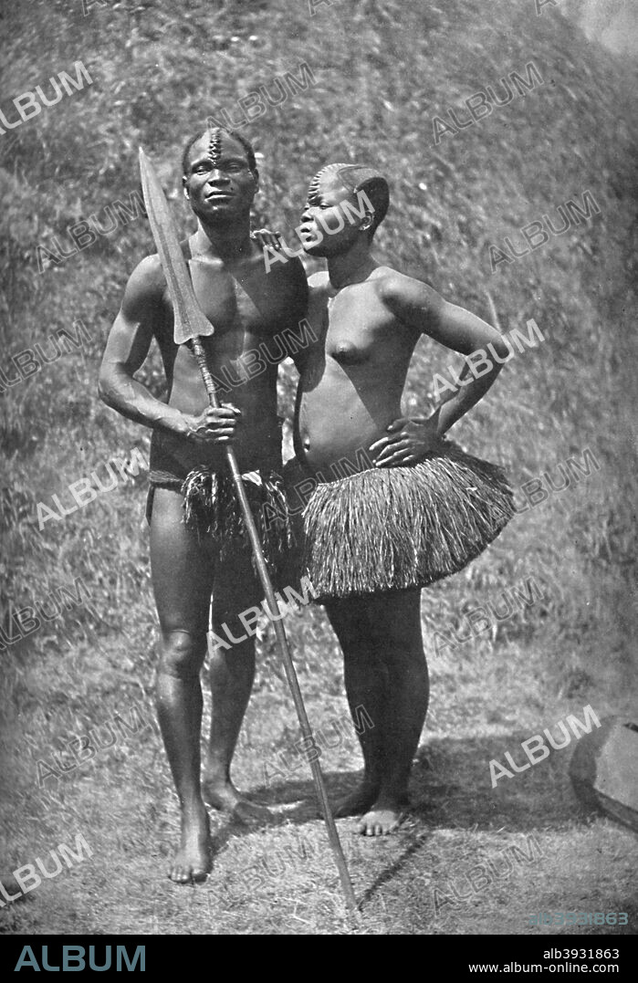 A Mulolo (Congo) warrior and his wife from the central Congo regions, 1902. From The Living Races of Mankind, Vol. I. [Hutchinson & Co, London, 1902].