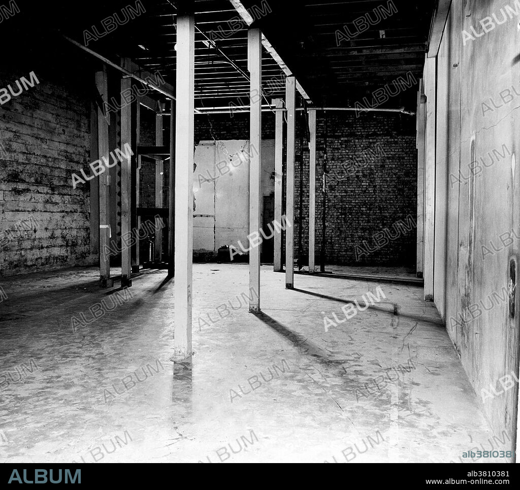 Birthplace of the Atomic Age, the Squash Court under the West Stands of Stagg Field, University of Chicago. Chicago Pile-1 (CP-1) was the world's first artificial nuclear reactor. The construction of CP-1 was part of the Manhattan Project, and was carried out by the Metallurgical Laboratory at the University of Chicago. It was built under the west viewing stands of the original Stagg Field. The first man-made self-sustaining nuclear chain reaction was initiated in CP-1 on December 2, 1942, under the supervision of Enrico Fermi. Fermi described the apparatus as "a crude pile of black bricks and wooden timbers." It was made of a large amount of graphite and uranium, with "control rods" of cadmium, indium, and silver, and unlike most subsequent reactors, it had no radiation shield or cooling system. Upon completion of the experiment, a coded message was transmitted to President Roosevelt: "The Italian navigator has landed in the new world.".