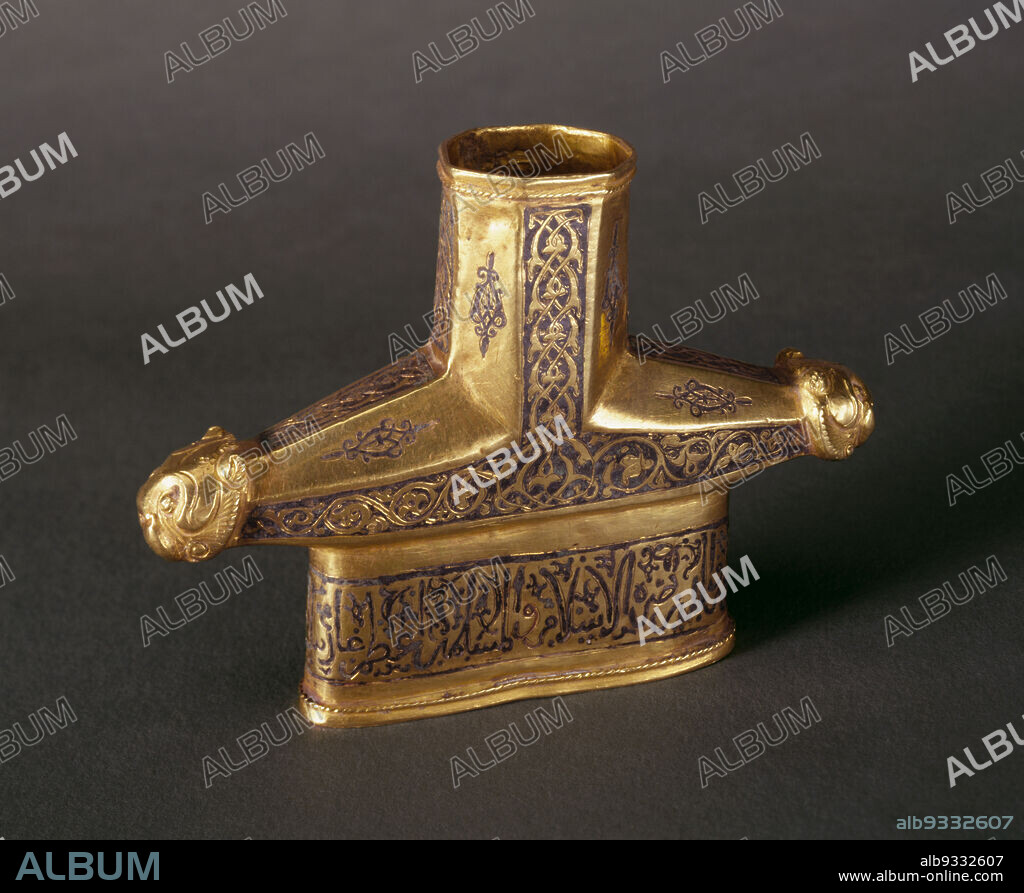 Sword Hilt with Design of Lion Heads, Arabesque Scrollwork, and Arabic Inscription, Persian, early 13th century, Gold with niello, Made in Hamadan, Hamadan province, Iran, Asia, Hamadan, Hamadan province, Iran, Asia, Arms & armor, metalwork, height: 3 1/2 in. (8.9 cm).
