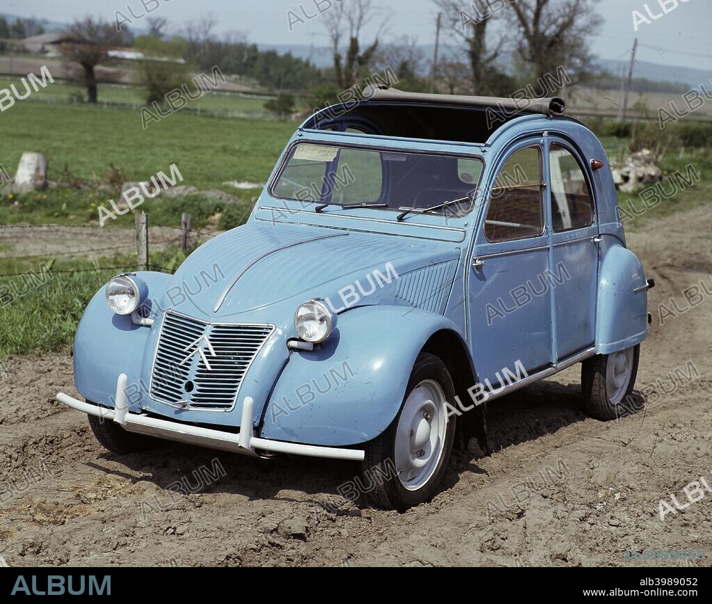 A 1959 Citroën 2CV CI. This is the last right hand drive car, from a total run of five million. Designed for rural use, the Deux Chevaux was conceived as 'an umbrella on four wheels', capable of carrying two people and 50 kilos of produce or a small barrel. Able to brave almost any road surface, this air-cooled car was cheap to run and allowed instant open-air motoring. Its simple but imaginative design made the most of resources in post-war France. Prototypes were built in 1937, though production did not begin until 1949.