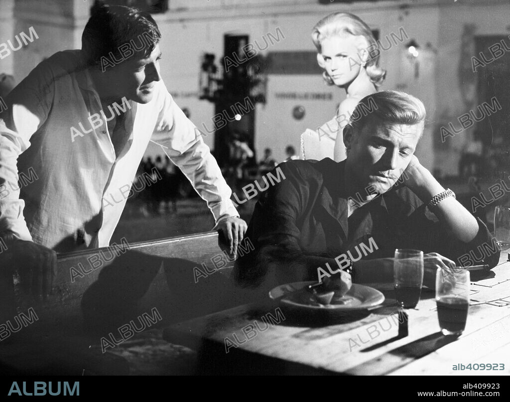 ALAN BATES, LAURENCE HARVEY and LEE REMICK in THE RUNNING MAN, 1963, directed by CAROL REED. Copyright COLUMBIA PICTURES.