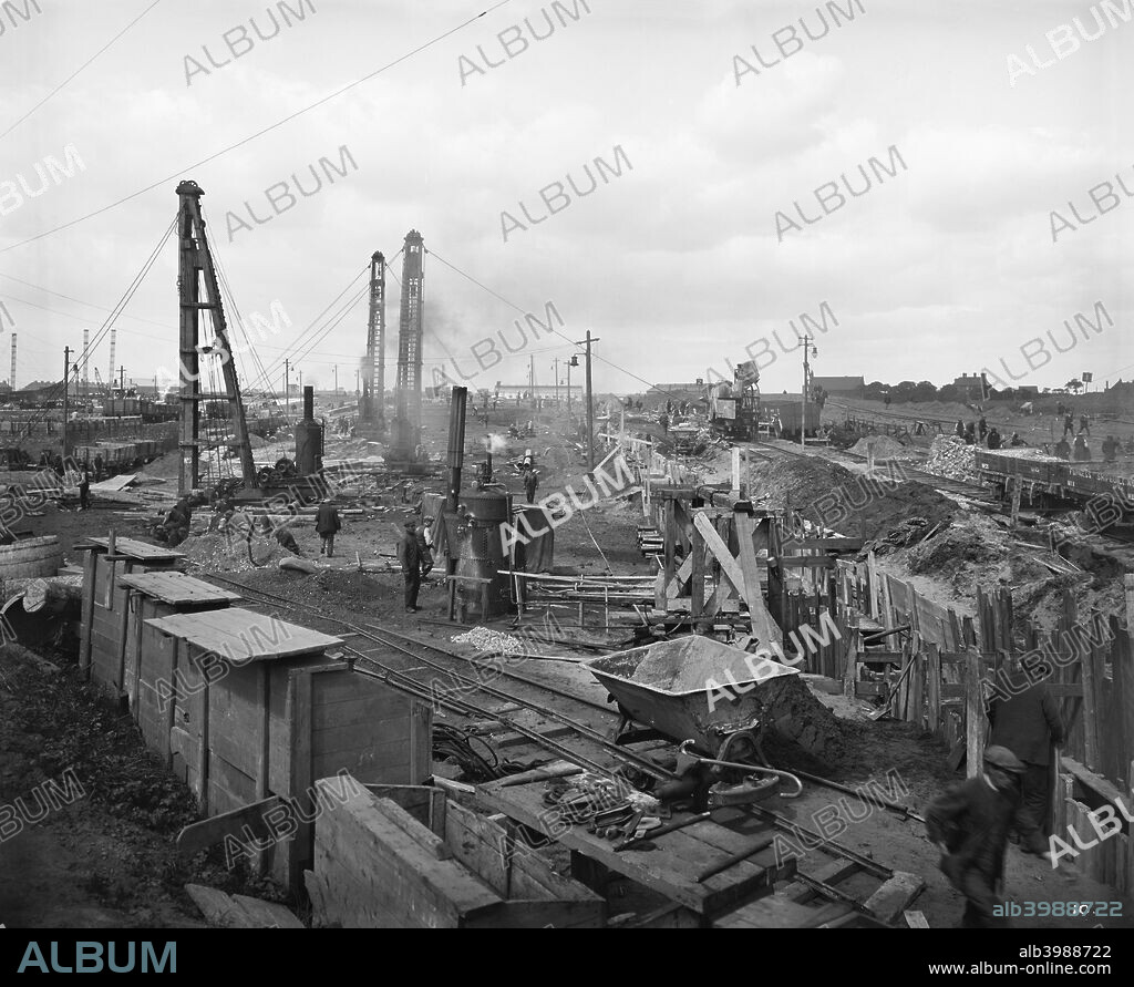 Furness Shipbuilding Yard, Billingham, Stockton-on-Tees, November 1918. Construction in progress with men working in the foreground. One of a series of images showing the construction of Furness Shipbuilding Yard at Haverton Hill. In 1917, authorisation was given for it to be built as a consequence of ships being sunk during the First World War.