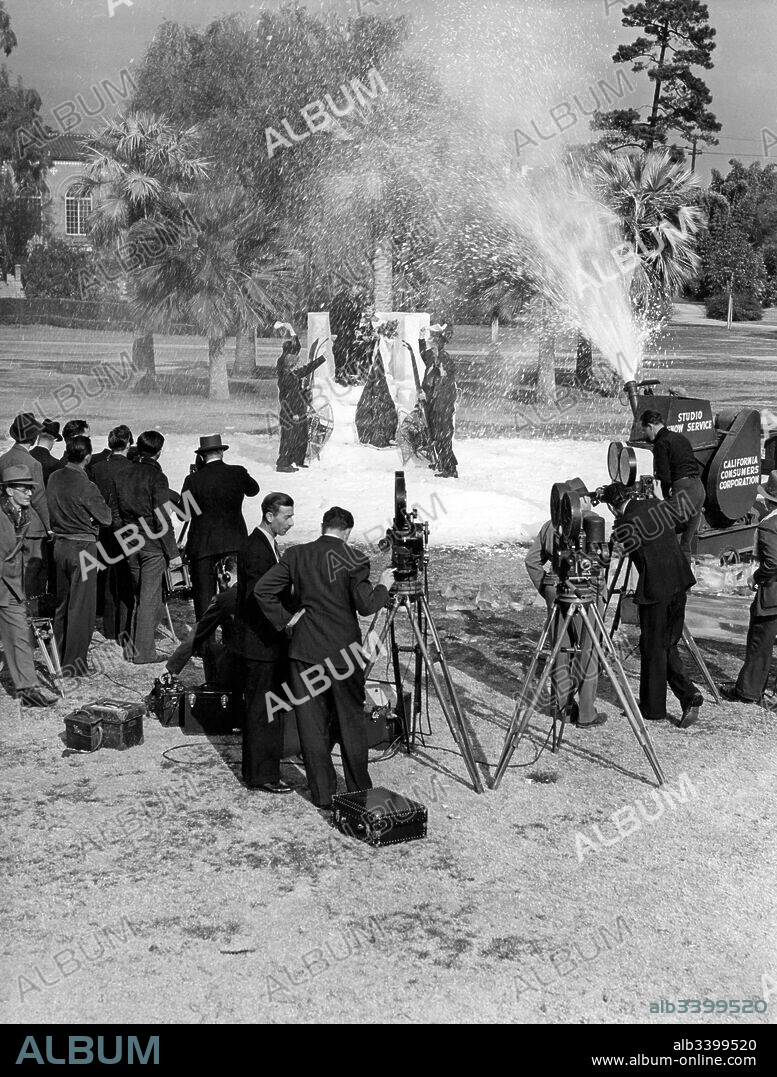 Los Angeles, California:  c. January, 1938   Los Angeles Snow Sports Carnival Queen Frances Gilmore is crowned in Lafayette Park with the aid of a studio snow making machine.
