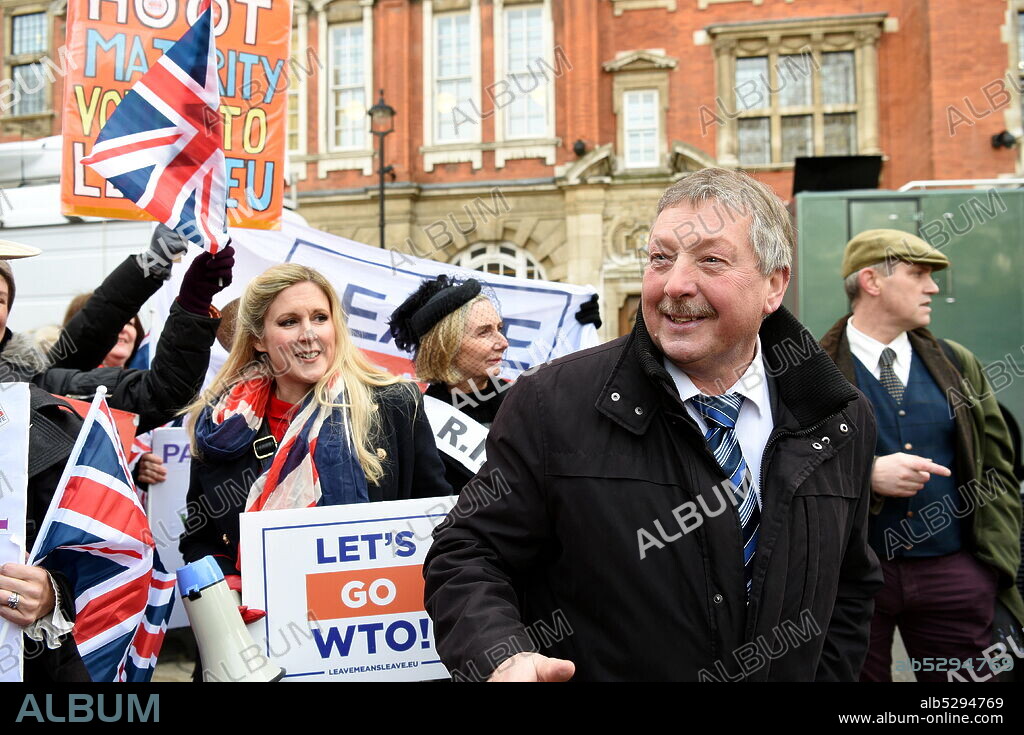 Photograph of Sammy Wilson. Samuel Wilson (1953-) a Democratic Unionist Party politician from Northern Ireland who has been the Member of Parliament for East Antrim since 2005. He served as a Member of the Legislative Assembly for Belfast East from 1998 to 2003 and for East Antrim from 2003 until 2015..