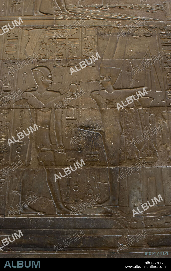 Relief depicting a pharaoh before MIN, god of fertility, represented with erect phallus. Chapel dedicated to Amun-Min. New Empire. Temple of Luxor. Egypt.