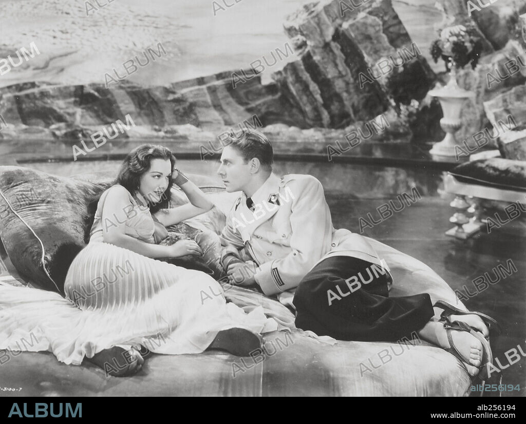 JEAN-PIERRE AUMONT and MARIA MONTEZ in SIREN OF ATLANTIS, 1949, directed by GREGG C. TALLAS. Copyright UNITED ARTISTS.
