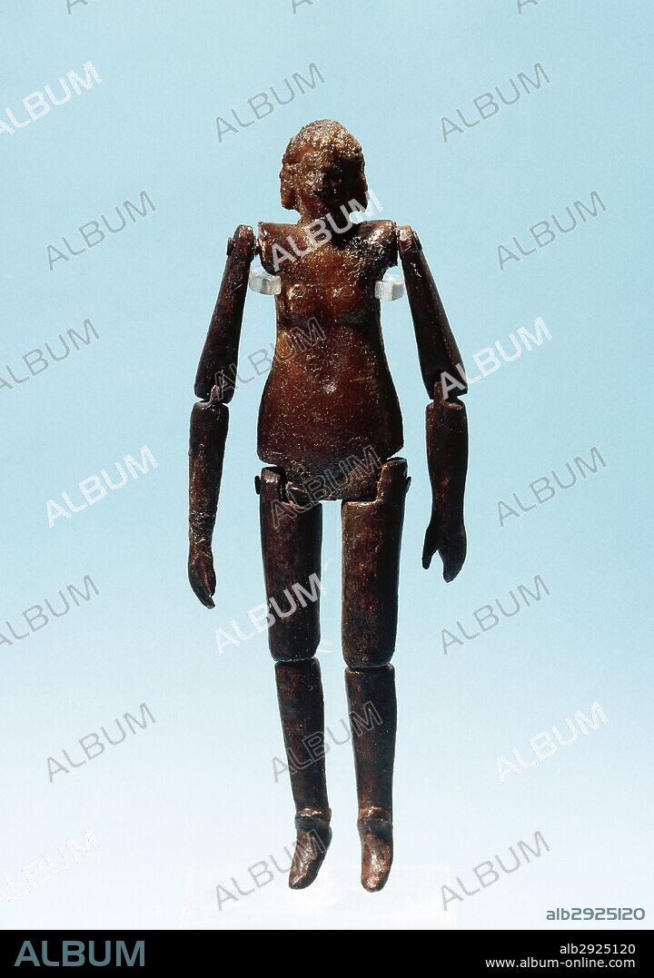Roman doll. Articulated arms and legs. Amber. From Necropolis of Ontur (Albacete province), 4th century. Albacete Provincial Museum. Castile-La Mancha. Spain.