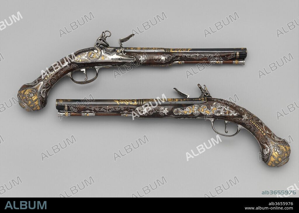 Pair of Flintlock Pistols Made for Ferdinand IV, King of Naples and Sicily (1751-1825). Barrelsmith: Emanuel Esteva (Spanish, active in Naples, Italy, recorded about 1768-73). Culture: Italo-Spanish, Naples. Dimensions: L. of each 17 3/8 in. (44.1 cm); L. of each barrel 11 1/16 in. (28.1 cm); Cal. .63 in. (16.0 mm); Wt. of each 2 lb. 4 oz. (1021 g). Gunsmith: Michele Battista (Spanish, active in Naples, Italy, recorded about 1760-90). Manufacturer: Royal Arms Manufactory at Torre Annunziata (Italian, Naples, established 1757). Date: ca. 1768.
The Royal Arms Factory in Naples was established in 1757 with the significant participation of Spanish gunmakers, who strongly influenced Neopolitan arms production in both technical innovations and artistic style. These magnificent pistols are signed by two leading craftsmen of the factory and appear to have been made for their patron, King Ferdinand IV of Naples and Sicily (1751-1825). What may be portraits of the young king and his queen on the butts of the pistols suggests that they were made to commemorate the royal wedding in 1768.