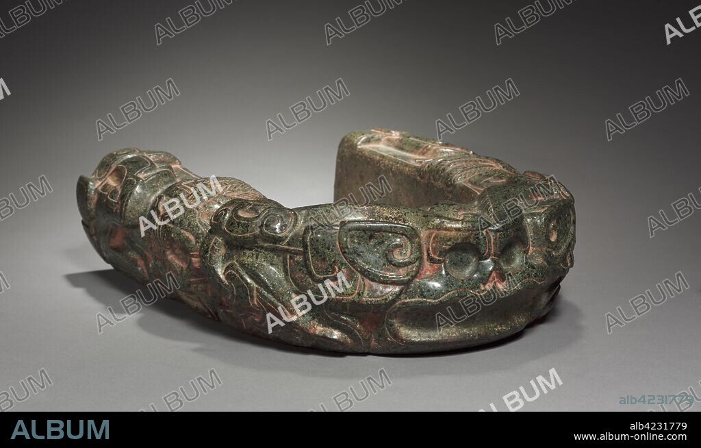 Ballgame Hip Protector (Yoke), 600-900. Mexico, Gulf Coast, Classic Veracruz style (600-1100). Greenstone, pigment; overall: 41.5 x 37.5 x 11 cm (16 5/16 x 14 3/4 x 4 5/16 in.).