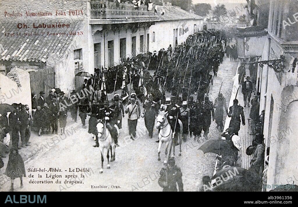 The French Foreign Legion parading through the streets of Sidi Bel Abbes, Algeria, 1906. Sidi Bel Abbes was the Legion's headquarters from 1931-1961. French postcard.