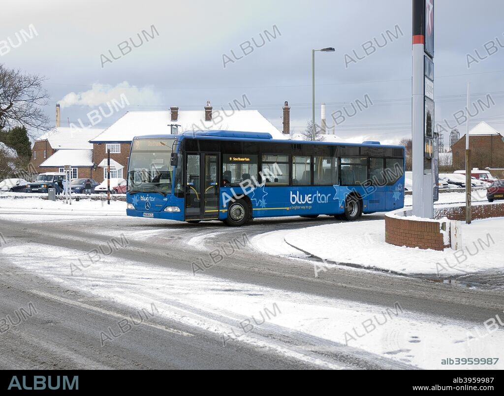 Solent Blue line Bus in snowy weather conditions.