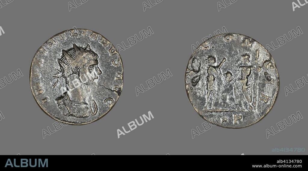 ANCIENT ROMAN. Antoninianus (Coin) Portraying Emperor Aurelian. Roman, minted in Siscia. Date: 270 AD-275 AD. Dimensions: Diam. 2 cm; 2.65 g. Billon. Origin: Roman Empire.