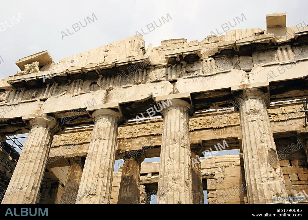 Greece. Athens. Acropolis. Parthenon. Classical temple dedicated to Athena. 447 BC-432 BC. Doric order. Architects: Iktinos and Callicrates. Sculptor Phidias. Pediment, establature with frieze, triglyph, metope, architrave, capital and columns. Architectural detail.