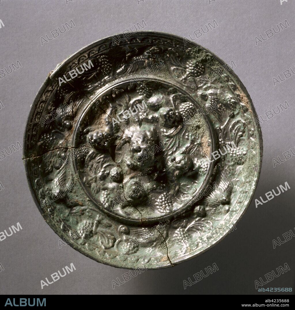 Animal-and-Grape Mirror, early 7th Century- early 10th Century. China, Tang dynasty (618-907). Bronze; diameter: 11.2 cm (4 7/16 in.); overall: 1.3 cm (1/2 in.); rim: 1.1 cm (7/16 in.).