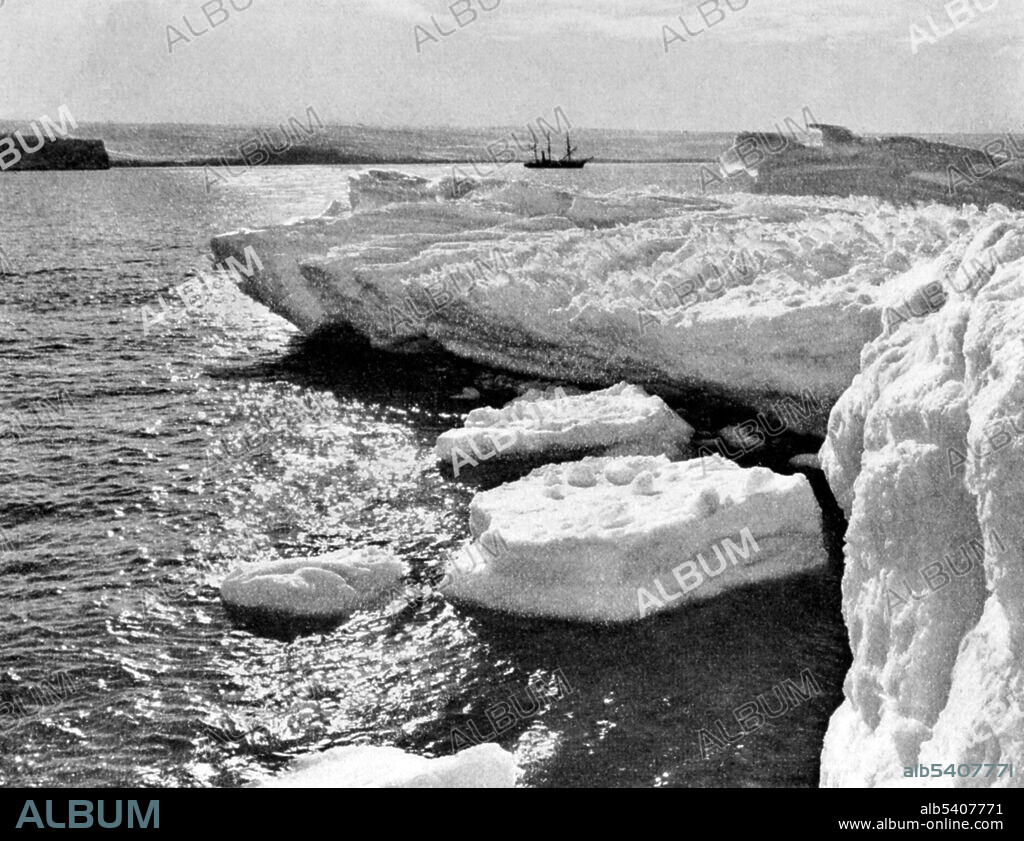 The SY Aurora during a calm evening in Commonwealth Bay. The Australasian Antarctic Expedition was a 1911-14 expedition headed by Douglas Mawson that explored the largely uncharted Antarctic coast due south of Australia. During its time in Antarctica, the expedition's sledging parties covered around 2,600 miles of unexplored territory, while its ship, SY Aurora, navigated 1,800 miles of unmapped coastline. Scientific activities included meteorological measurements, magnetic observations, an expansive oceanographic program, and the collection of many biological and geological samples, including the discovery of the first meteorite found in Antarctica. Photographed by Frank Hurley (cropped and cleaned).
