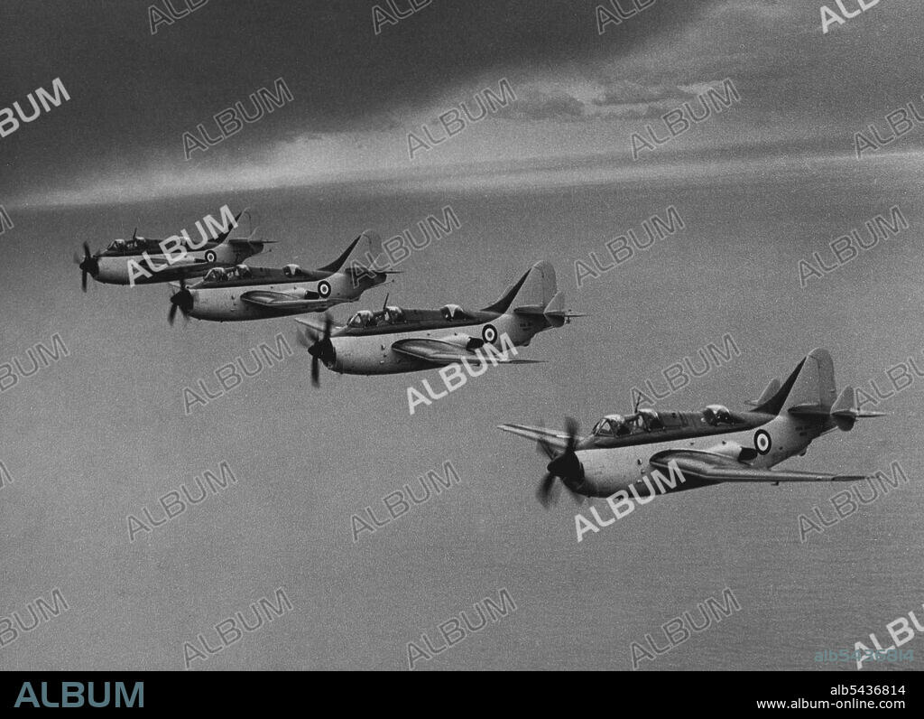 Navy's Anti-Submarine Planes Today's picture of 703 X flight of the Fairey Gannet anti-submarine aircraft that have just been formally inaugurated at the R.N. Air Station at Ford, in Sussex. This air-to-air picture was taken after the ground ceremony earlier. April 5, 1954.