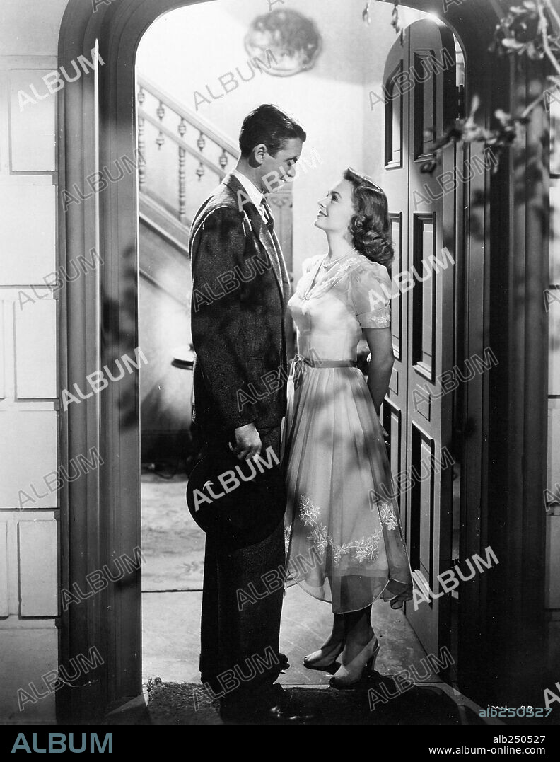DONNA REED and JAMES STEWART in IT'S A WONDERFUL LIFE, 1946, directed by FRANK CAPRA. Copyright RKO.