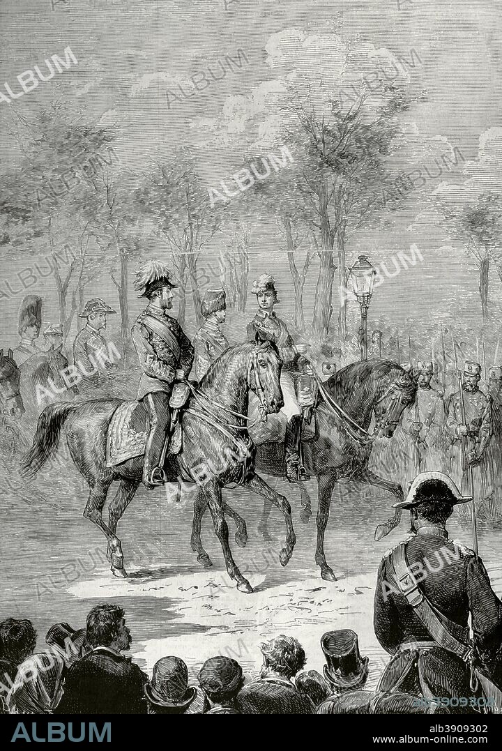 Visita del Príncipe de Gales a Madrid, España. El Príncipe Alberto Eduardo, futuro Eduardo VII (1841-1910) y S. M. el Rey Don Alfonso XII de España (1857-1885) pasando revista a las tropas durante un evento celebrado el 26 de abril de 1876. Dibujo del natural por Ricardo Balaca (1844-1880). Grabado por Capuz (1834-1899). La Ilustración Española y Americana, 30 de abril de 1876. Biblioteca Histórico Militar de Barcelona. Cataluña, España.