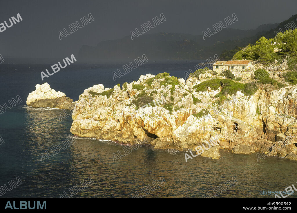 storm approaching Cala Deia, the white rocks, (Codols Blancs).Deia.Tramuntana.Mallorca.Baleares.Spain.
