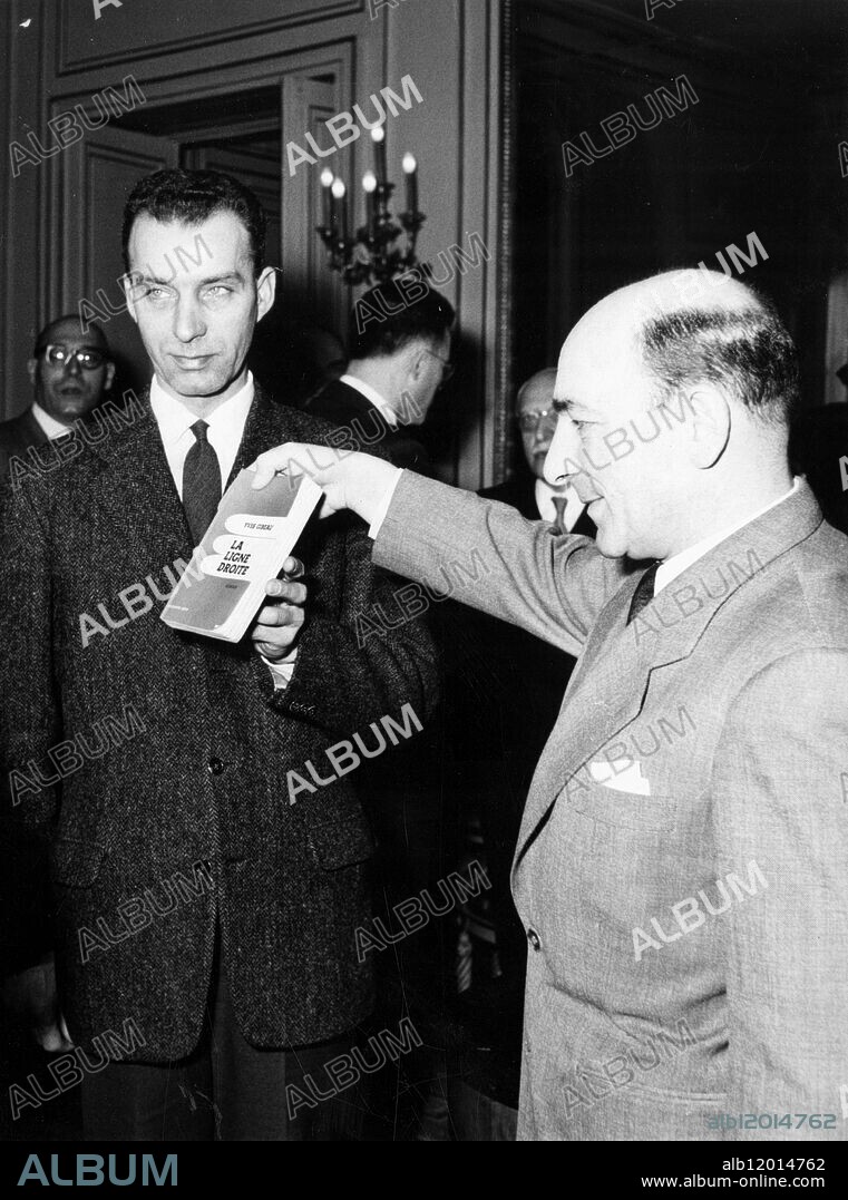 Yves Gibeau clutching the book "La Ligne Droite.". 19 February 1957.