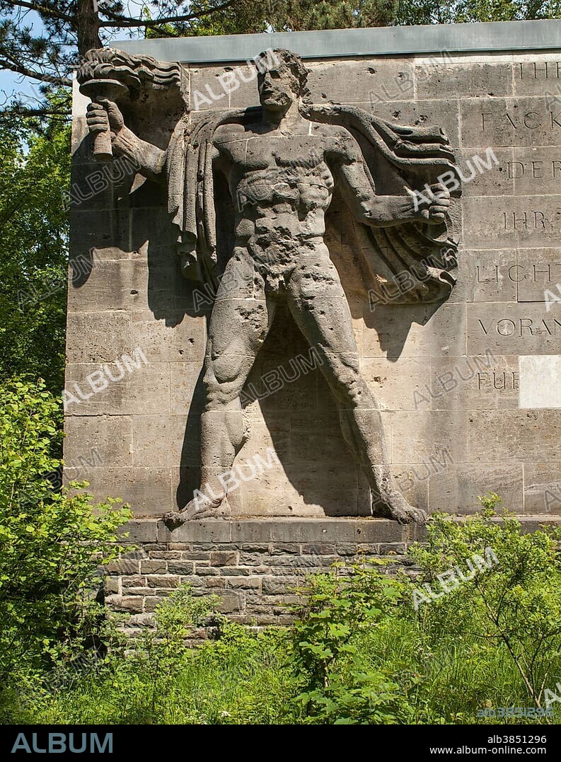 Sculpture torchbearer, representation of the Aryan master race Herrenmensch, Ordensburg Vogelsang, educational centre of the NSDAP from 1936-1939, now Forum Vogelsang, Eifel, North Rhine-Westphalia, Germany, Europe.