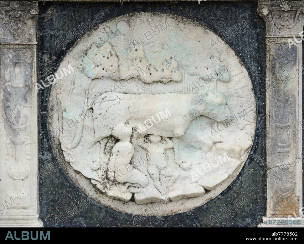 ROMOLO and REMO suckled by the Lupa (traditionally, 8th century BC), the two mythological twins descended from Enea to whom the foundation of Rome is attributed. "Romuls Remus", bas-relief decoration from the band depicting famous ancient figures and mythological themes, inspired by the medals of the Roman era, carved on the base of the facade of the Basilica of the Certosa di Pavia, a typical example of Lombard Renaissance architecture XV century.