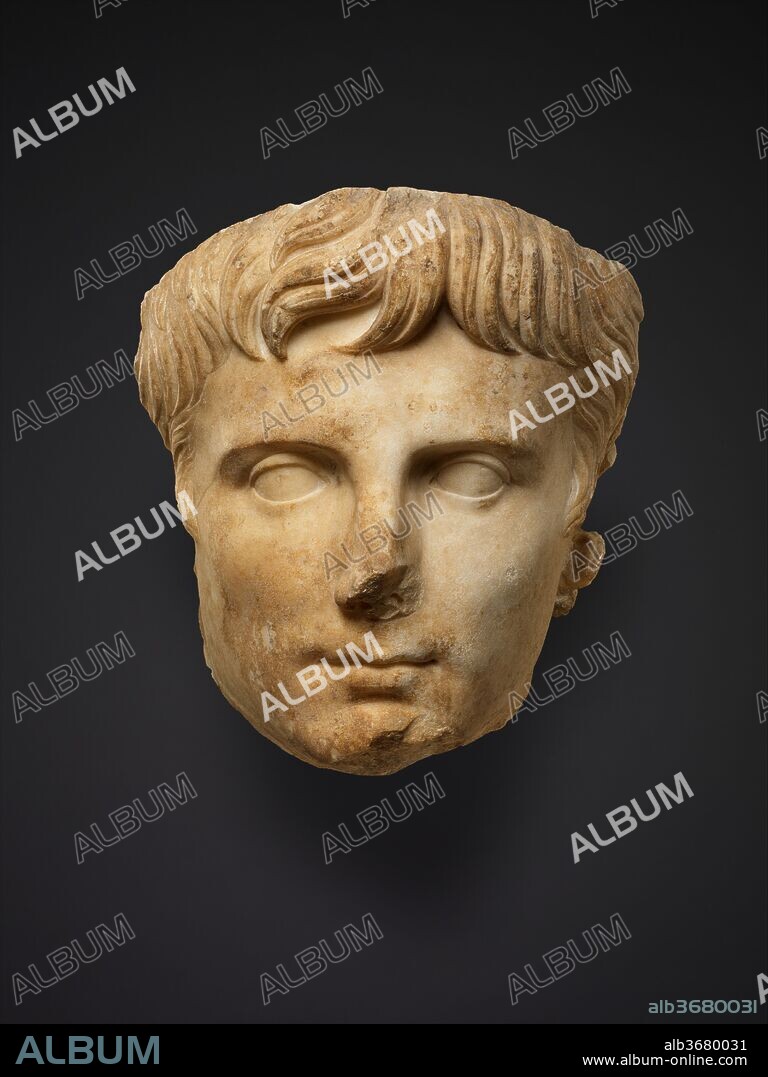 Marble portrait of the emperor Augustus. Culture: Roman. Dimensions: 12in. (30.5cm). Date: ca. A.D. 14-37.
This over life-size fragment may have been part of a seated statue of the emperor made during the reign of his step-son and successor, Tiberius. Over two hundred and fifty portraits of Augustus, including numerous full-length statues, are known today. In antiquity, there were probably as many bronze statues of the emperor as there were marble ones, but relatively few of the former have survived. Augustus himself claimed to have removed eighty silver statues that had been set up in his honor in the city of Rome alone.
Although Augustus' features are individualized, he is represented in an idealized, ageless way. When he died in A.D. 14, he was seventy-seven years old, but no portraits of him in old age are known.