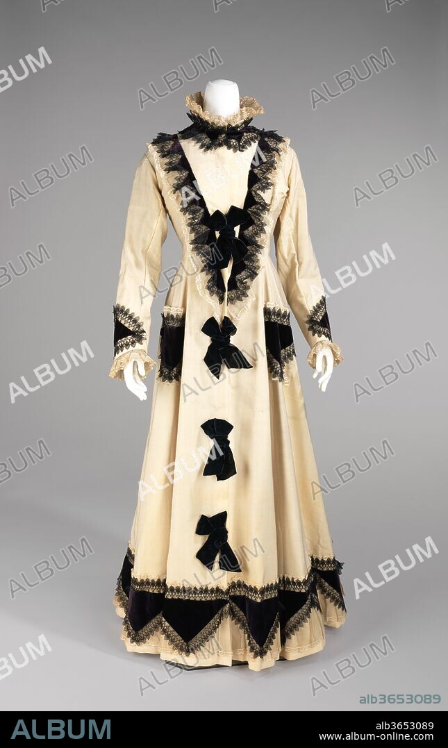 Tea gown. Culture: American. Date: 1875.
This teagown belonged to Amelia Beard Hollenback (1844-1918), wife of the prominent financier and philanthropist John Welles Hollenback (1835-1927). In 1874, the Hollenback family settled in the modestly affluent neighborhood of Clinton Hill in Brooklyn. The first teagowns, which were worn as at-home attire when entertaining guests, made their first appearance in the late 1870s. Worn in the months immediately after the Hollenback's first daughter was born, this early example illustrates Amelia Hollenback's keen awareness of fashion.