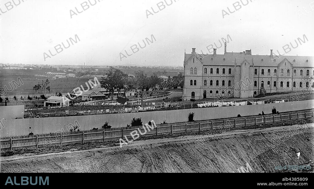 Negative - View of Little Sisters of the Poor Convent, Northcote, Victoria, 1892, View of Little Sisters of the Poor Convent and Home for the elderly, taken from from Westbourne Grove, Northcote, next to Thomas Beckett's residence, November 1892. Photograph taken by Thomas Beckett. Part of a collection of glass plate negatives taken by Dr Thomas George Beckett, doctor, pioneering radiologist and amateur photographer between 1891 and 1910. The collection is primarily of.
