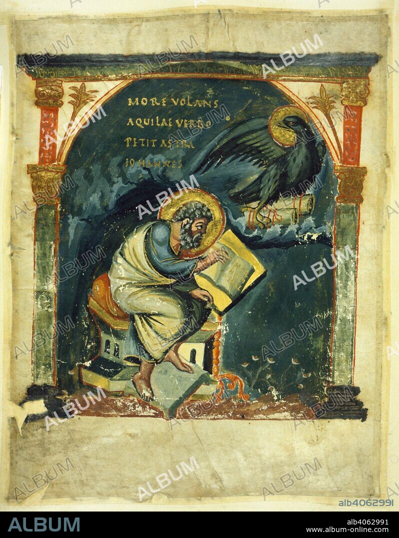 St. John seated. Coronation Gospels. S. Netherlands [Lobbes, near Liege]; circa 897-900. [Whole folio] St. John writing his gospel, with his symbol, the eagle, holding a scroll. The gospels were possibly a gift from Emperor Otto I of Germany to Athelstan, who presented them to Christ Church, Canterbury, and were used as the Coronation Book of the Anglo Saxon kings  Image taken from Coronation Gospels.  Originally published/produced in S. Netherlands [Lobbes, near Liege]; circa 897-900. . Source: Cotton Tiberius A. II, f.164v. Language: Latin.