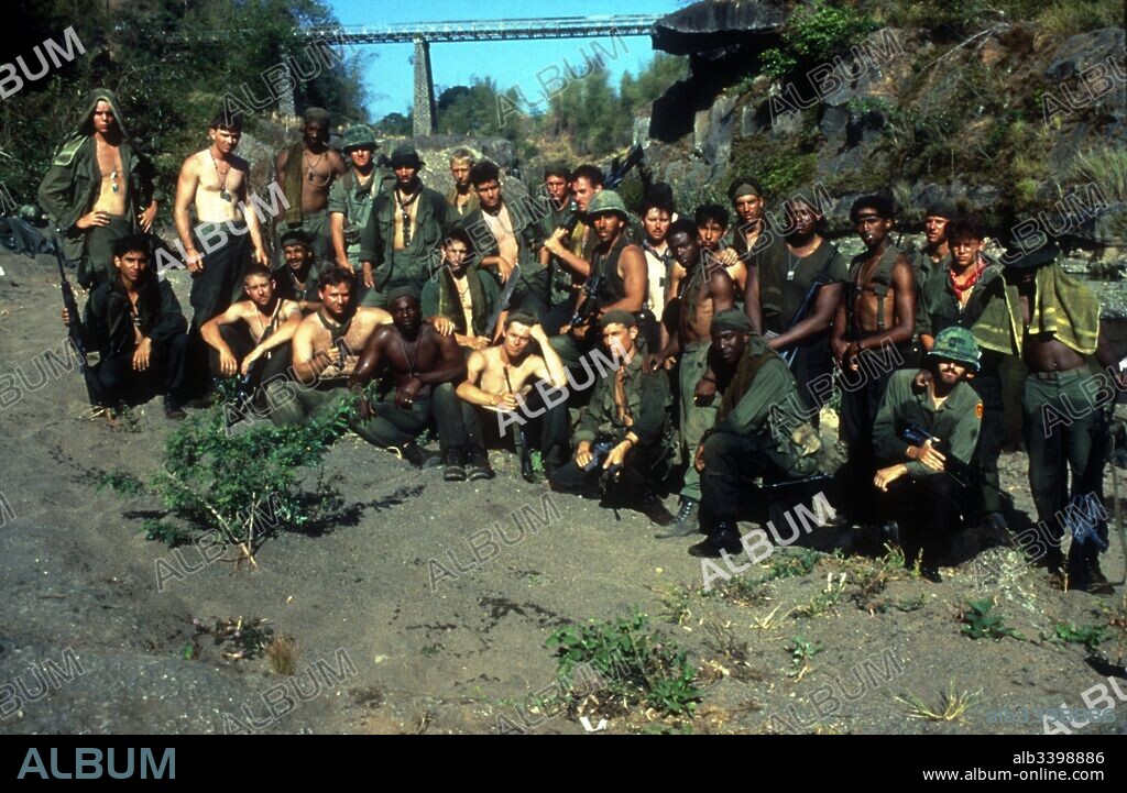 CHARLIE SHEEN, CHRIS PEDERSON, DALE DYE, DAVID NEIDORF, FOREST WHITAKER, FRANCESCO QUINN, JOHN McGINLEY, JOHNNY DEPP, KEVIN DILLON, MARK MOSES, PAUL SANCHEZ, REGGIE JOHNSON, RICHARD EDSON, TOM BERENGER, TONY TODD and WILLEM DAFOE in PLATOON, 1986, directed by OLIVER STONE. Copyright ORION PICTURES.