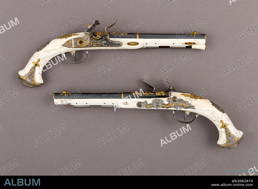 Pair of Flintlock Pistols of Empress Catherine the Great (1729-1796). Culture: Russian, Saint Petersburg. Dimensions: L. of each 14 1/2 in. (36.8 cm). Gunsmith: Johan Adolph Grecke (Russian, Saint Petersburg, recorded 1755-90). Date: 1786.
These pistols are part of a deluxe garniture of ivory-stocked hunting arms made for Empress Catherine the Great (reigned 1762-96), whose intial (E for Ekaterine) is on the escutcheons of the grips. The garniture, which originally consisted of these pistols, a fowling piece dated 1786 (National Museum, Warsaw), and a rifle (whereabouts unknown), was later given to her favorite, Prince Stanislas August Poniatowski (1732-1798), whom she backed as king of Poland (reigned 1763-95). Firearms with ivory stocks, generally out of fashion in western Europe by the eighteenth century, were in vogue in the ostentatious Russian court during the last quarter of the century.