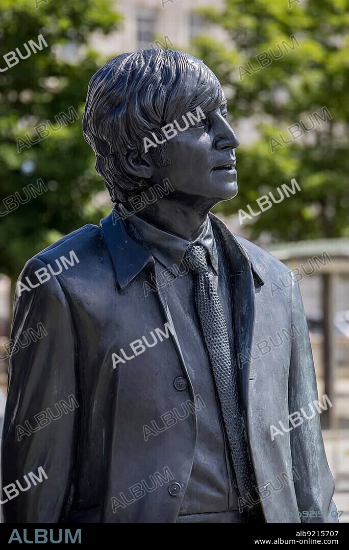 LIVERPOOL, UK - JULY 14 : Statue of John Lennon of the Beatles in Liverpool, England on July 14, 2021.