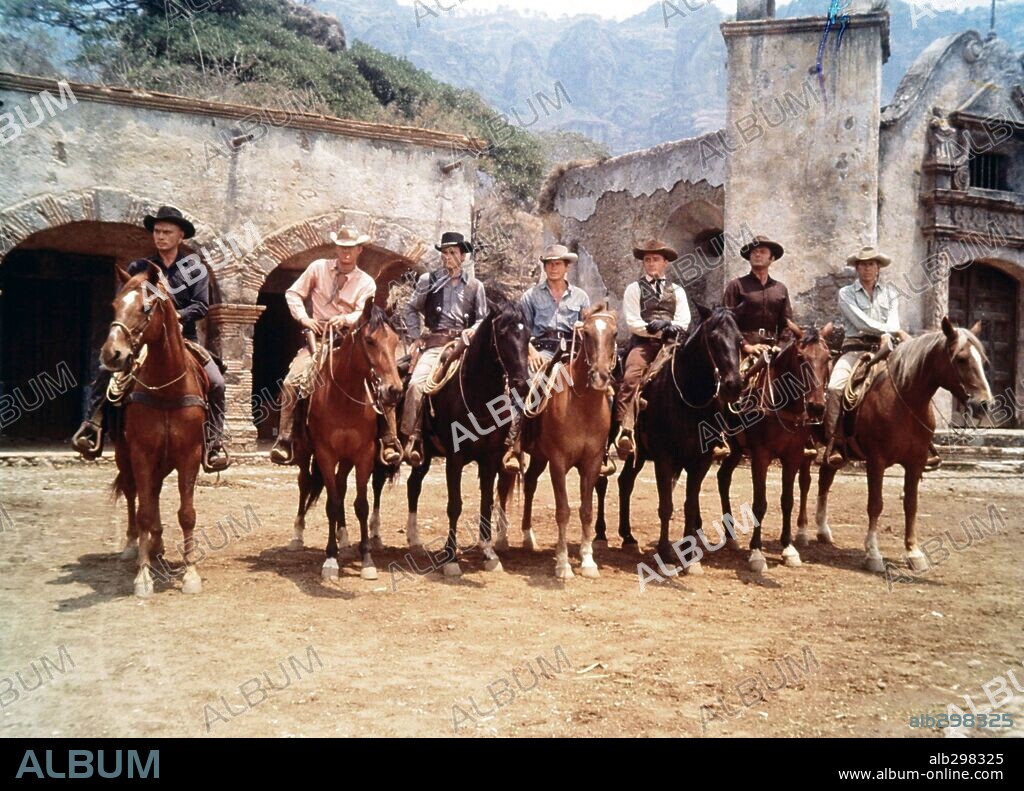 BRAD DEXTER, CHARLES BRONSON, HORST BUCHHOLZ, JAMES COBURN, ROBERT VAUGHN, STEVE MCQUEEN and YUL BRYNNER in THE MAGNIFICENT SEVEN, 1960, directed by JOHN STURGES. Copyright UNITED ARTISTS.