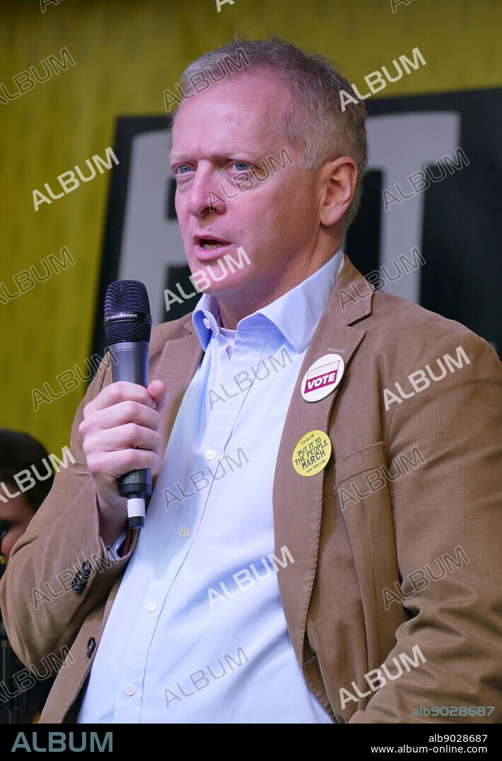 Phillip James Lee, British, Conservative politician, Member of Parliament (MP) for Bracknell, addresses the 'People's Vote' march in Parliament Square, London. The People's Vote march took place in London on 23 March 2019 as part of a series of demonstrations to protest against Brexit, call for a new referendum, and ask the British Government to revoke Article 50. It brought to the capital hundreds of thousands of protestors, or over a million people according to the organizers.