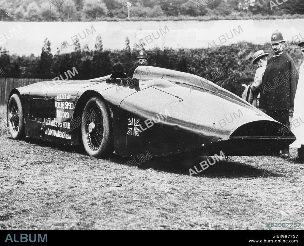Sunbeam 1000 hp car, 1927. Policemen looking at one of the fastest cars of its time. Major Henry Segrave, winner of the 1923 French Grand Prix, became a serious challenger to Malcolm Campbell's established records. Segrave took the giant Sunbeam to Daytona Beach, Florida because it offered hard sand and a nine-mile course. The power unit was two V12, 435 hp, 48 valve Matabele aero-engines with chain drive to the wheels. On 29th March 1927 on the car's first run a speed of 200 mph was reached for the first time, but the car had to be driven into the sea to slow down. On the return run with new brakes, a record speed of 203.793 mph (327.973 kph) was achieved.