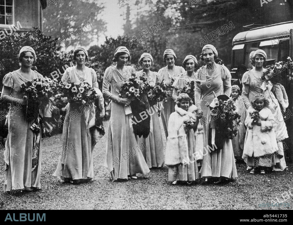 Village Wedding of Lady May Cambridge - The three tiny bridesmaids are Princess Elizabeth, Lady Mary Cambridge, and Miss Jennifer Bevan, and at the back are Princess Ingrid, of Sweden, Princess Sybille of Saxe-Coburg-Gotha, Lady Alice Scott, Hon. Imogen Rhys, Miss Cathleen Alington, Miss Wenefryd Tabor, Miss Verena Seymour and Miss Phyllis Seymour Holm. December 16, 1931. (Photo by Central News).