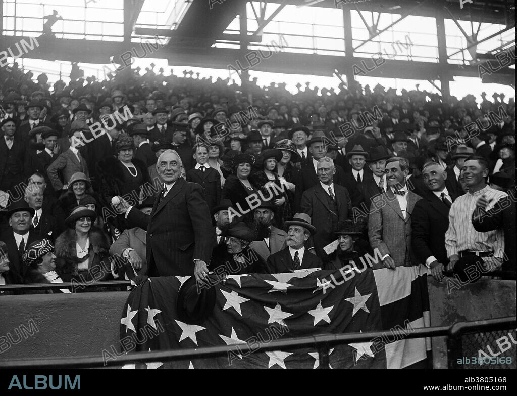 President Harding at Baseball game, Washington. Warren Gamaliel Harding (November 2, 1865 - August 2, 1923) was the 29th President of the United States (1921-23). He defeated Democrat James M. Cox with the largest popular vote landslide (60% to 34%) in presidential history. He sought out the "best minds" in his cabinet, including Andrew Mellon at the Treasury, Herbert Hoover at Commerce, and Charles Evans Hughes at the State Department. He signed the first federal child welfare program, and dealt with striking mining and railroad workers in part by supporting an 8-hour work day. He created the Bureau of the Budget to prepare the first US federal budget. He advocated an anti-lynching bill to curb violence against African Americans, but it failed to pass Congress. In August 1923, Harding suddenly collapsed and died at the age of 57. In recent years there has been some recognition of his fiscal responsibility and endorsement of African-American civil rights. Harding has been viewed as a more modern politician who embraced technology and was sensitive to the plights of minorities, women, and labor. Photographed by Harris & Ewing, circa 1921-23.