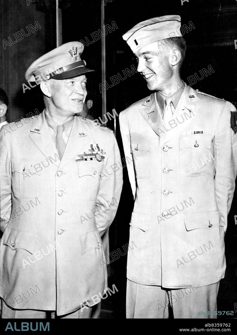Big Ike and Young Ike - General Dwight D. Eisenhower ***** his infectious grin on his young son,Lt. ***** Sheldon Eisenhower (right) as the father and ***** leave a banquet given in Big Ike's honor by president Truman. The stag affair was attended by the entire Eisenhower party, which arrived in the U.S. aboard a transport, as well as high military and civilian dignitaries. June 19, 1945. (Photo by ACME).